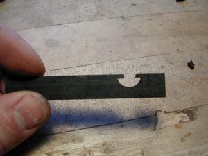 A one-cute template for a ferrule that has an arc with a uniform radius.